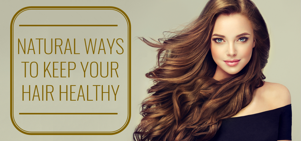 a girl with long brown hair and a text that says "Natural ways to keep your hair health"