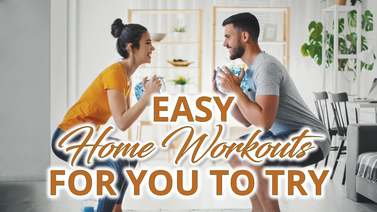 A couple crouching and working out at home with a text Easy home workouts for you to try